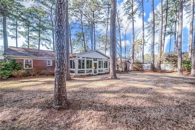 exterior space with a sunroom