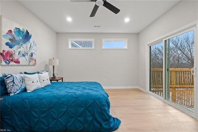 bedroom with visible vents, light wood-style flooring, recessed lighting, baseboards, and access to exterior