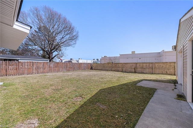 view of yard featuring a fenced backyard