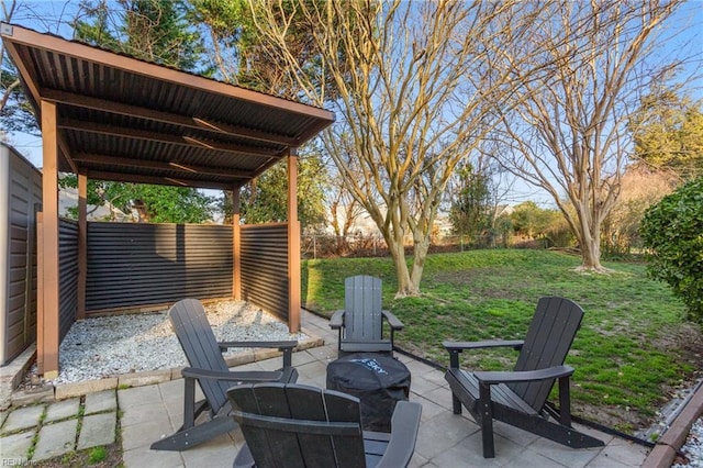 view of patio featuring fence