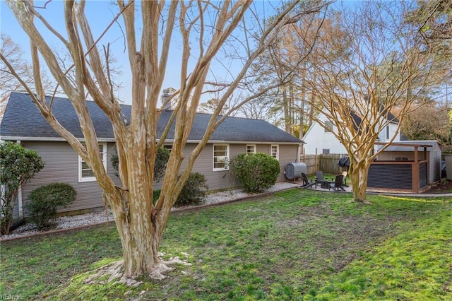 view of yard featuring a patio area and fence