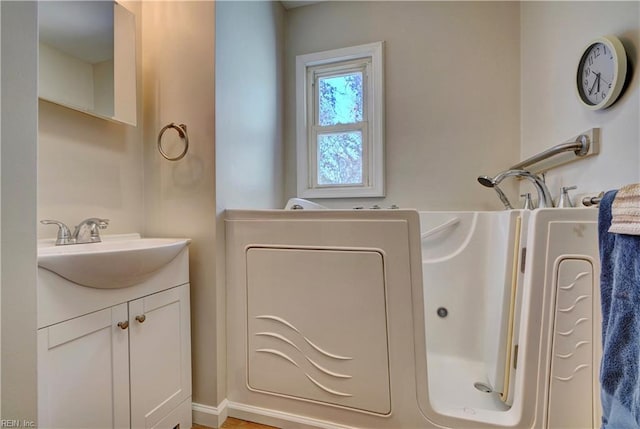 full bathroom with vanity