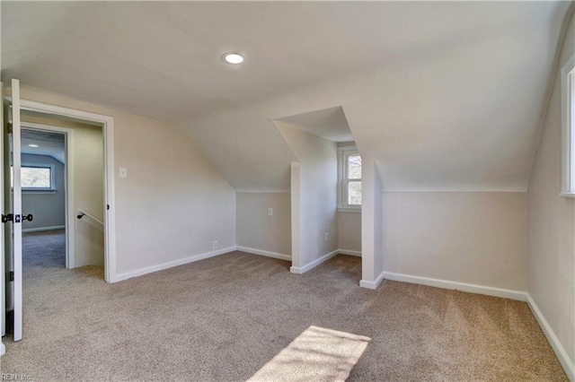 bonus room with recessed lighting, baseboards, carpet flooring, and vaulted ceiling