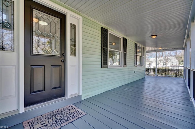 deck with covered porch