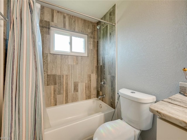 full bath with shower / bath combination with curtain, toilet, vanity, and a textured wall