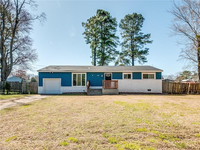 ranch-style home with fence, driveway, a front lawn, a garage, and crawl space