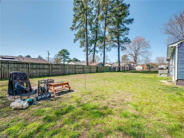 view of yard with fence