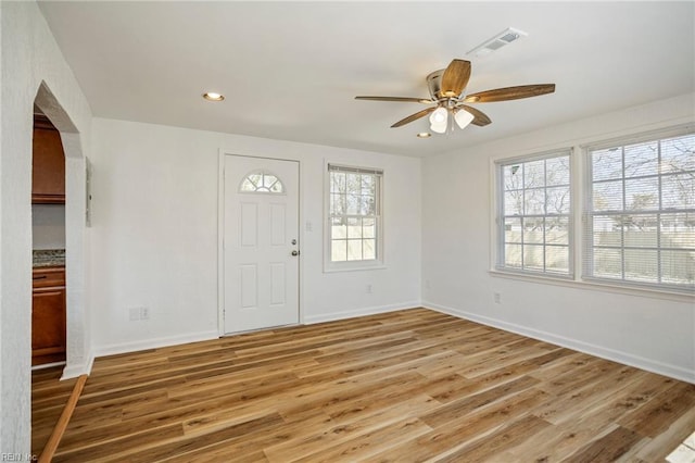 foyer featuring visible vents, baseboards, light wood-type flooring, recessed lighting, and a ceiling fan