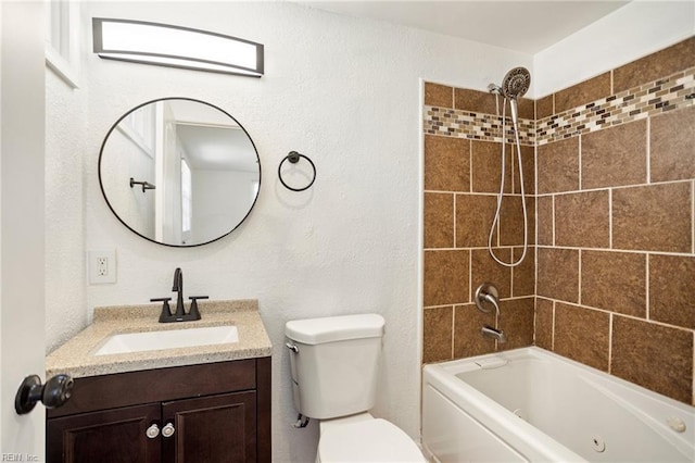 full bath featuring toilet,  shower combination, and vanity