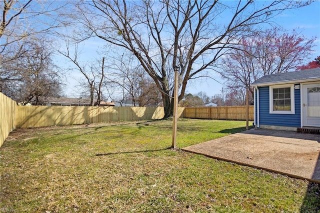 view of yard with a patio and a fenced backyard