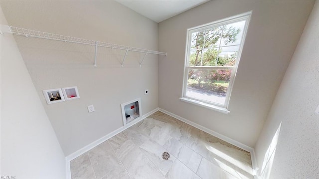 laundry area featuring washer hookup, laundry area, baseboards, and hookup for an electric dryer