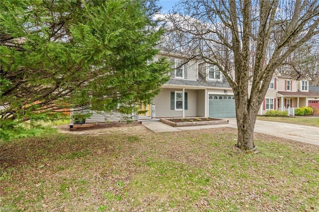 view of front of house with a front yard and driveway