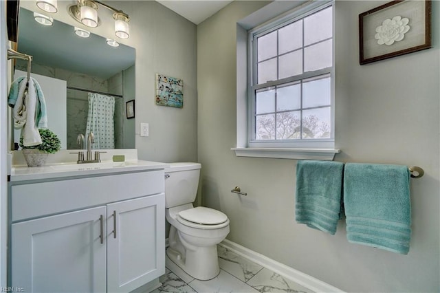 bathroom with toilet, marble finish floor, a shower with shower curtain, baseboards, and vanity