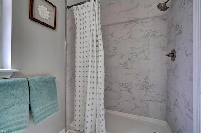 full bath with a shower with curtain