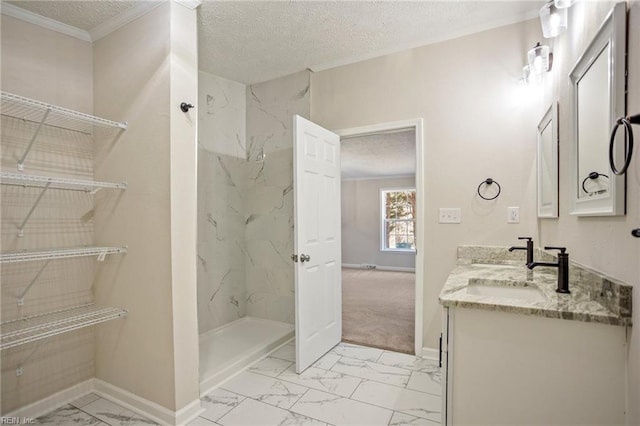 full bathroom featuring baseboards, marble finish floor, a marble finish shower, and a textured ceiling