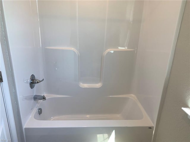 bathroom featuring washtub / shower combination