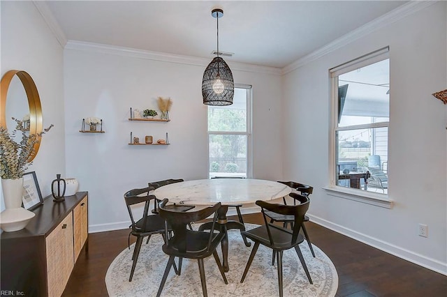 dining space with visible vents, baseboards, dark wood-style floors, and crown molding