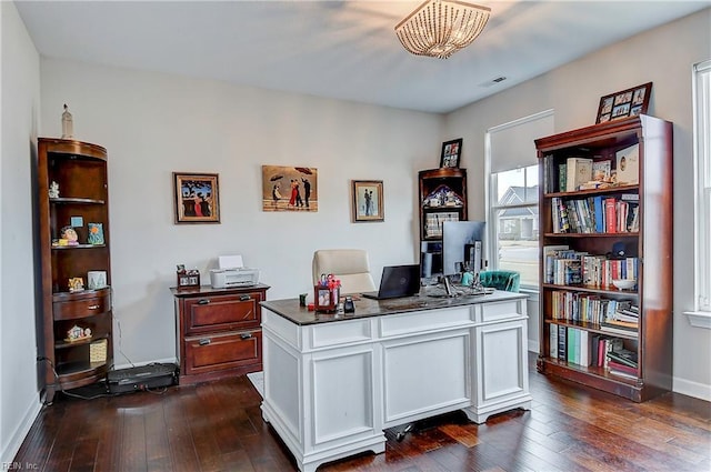 office with visible vents, dark wood-style flooring, and baseboards