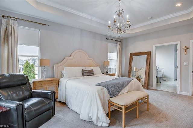 bedroom with a raised ceiling, multiple windows, carpet flooring, and a chandelier