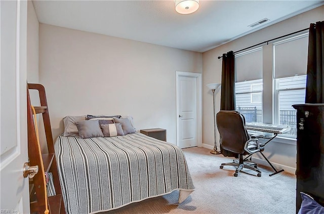 bedroom featuring carpet flooring, baseboards, and visible vents