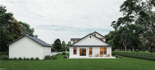 back of house featuring board and batten siding, a yard, and fence