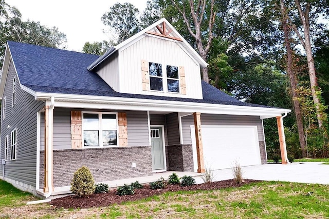 view of front facade with brick siding, an attached garage, driveway, and roof with shingles