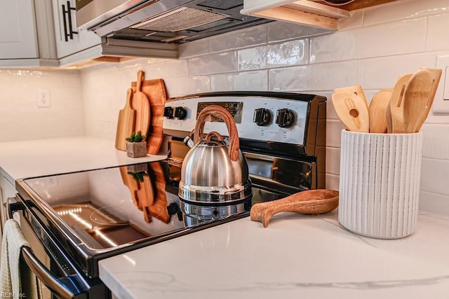 details with backsplash, light countertops, and stainless steel range with electric cooktop