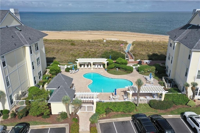 bird's eye view with a beach view and a water view