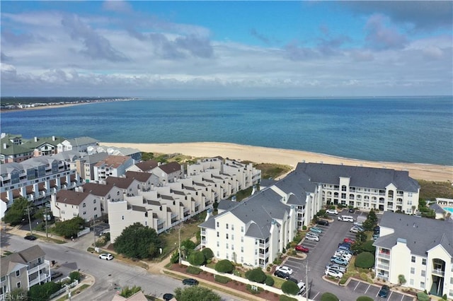 birds eye view of property featuring a water view and a residential view