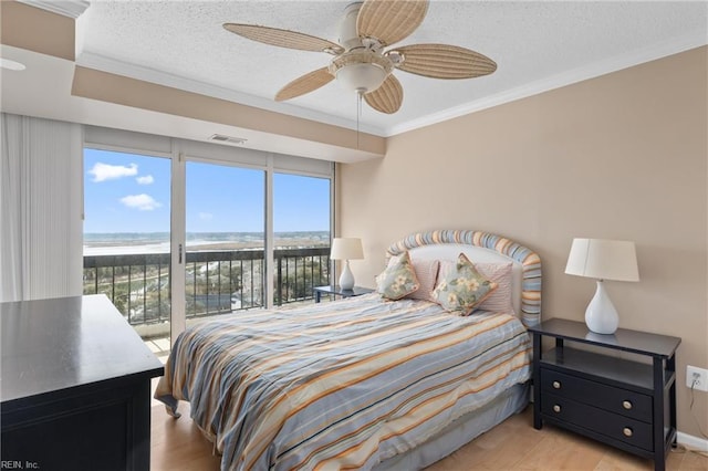 bedroom with a ceiling fan, visible vents, access to exterior, a textured ceiling, and crown molding