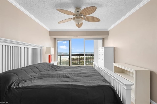 bedroom with a textured ceiling, ornamental molding, a ceiling fan, and access to outside