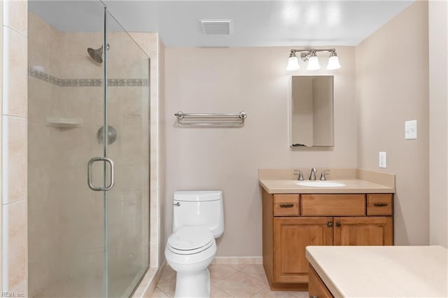 bathroom featuring visible vents, a shower stall, toilet, tile patterned floors, and vanity