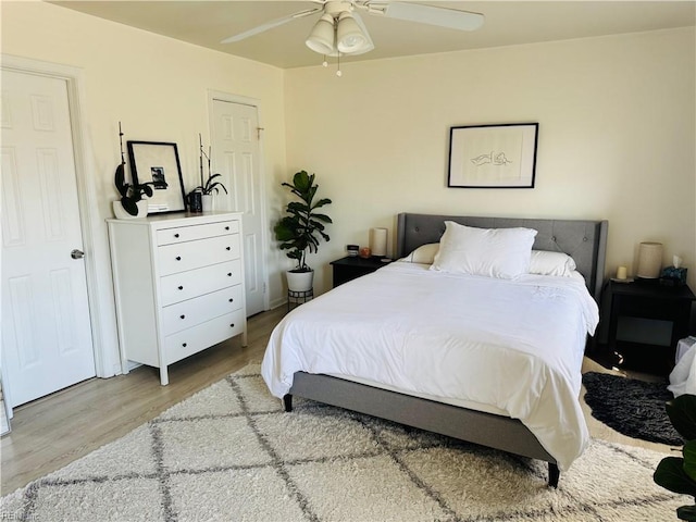 bedroom featuring ceiling fan and wood finished floors