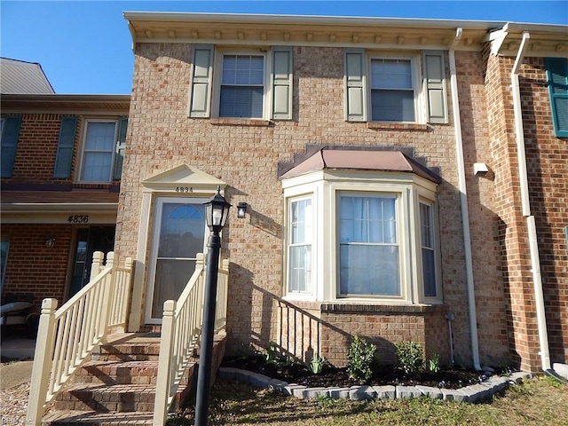 multi unit property featuring brick siding