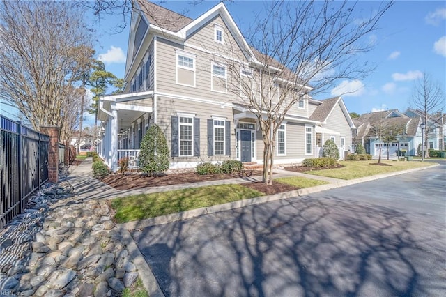 view of front of house with fence