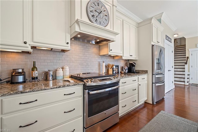 kitchen featuring custom exhaust hood, stainless steel appliances, dark wood-type flooring, crown molding, and tasteful backsplash