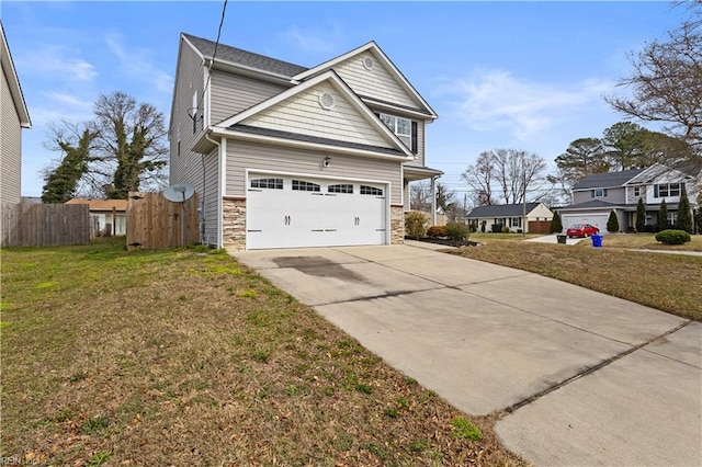 view of property exterior with fence, concrete driveway, a garage, stone siding, and a lawn