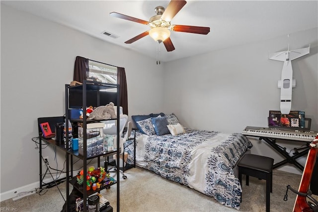 bedroom with baseboards, carpet, visible vents, and ceiling fan