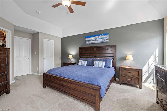 bedroom with baseboards, ceiling fan, and carpet flooring