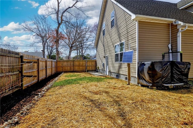 view of yard featuring a fenced backyard