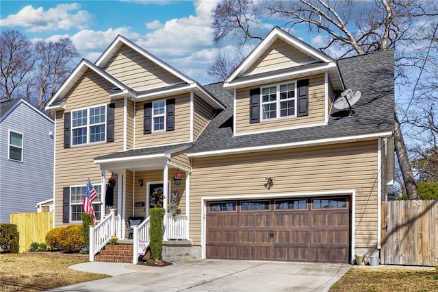 view of front facade featuring a shingled roof, driveway, and fence