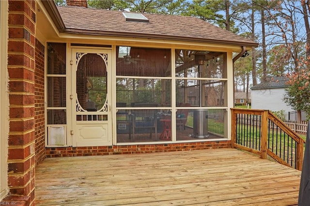 deck featuring a sunroom