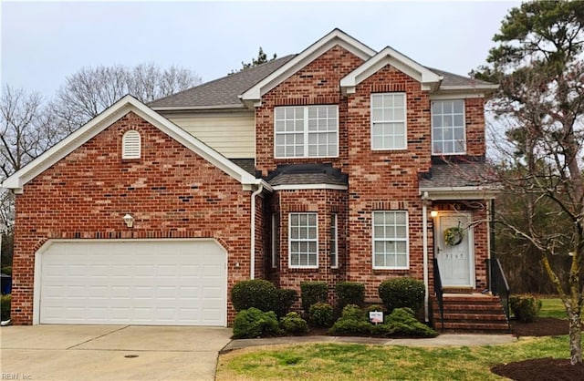 traditional-style home featuring brick siding, roof with shingles, and driveway