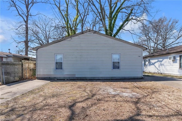 view of side of property with fence