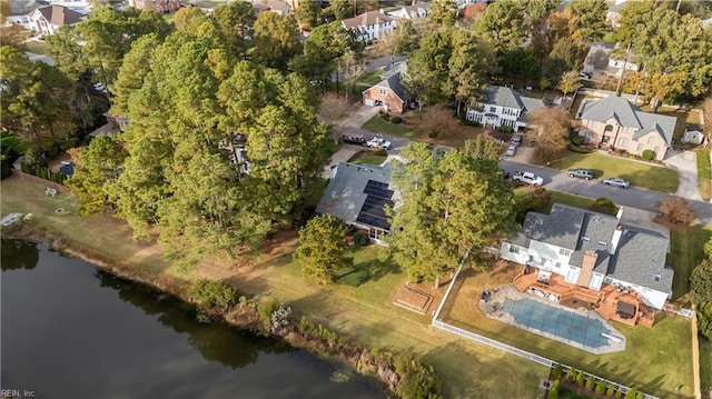 birds eye view of property with a residential view and a water view