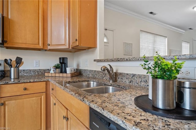 kitchen featuring visible vents, ornamental molding, light stone countertops, and a sink