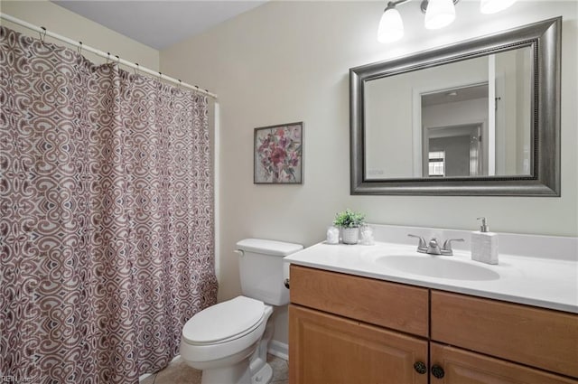 full bath with tile patterned floors, a shower with curtain, toilet, and vanity