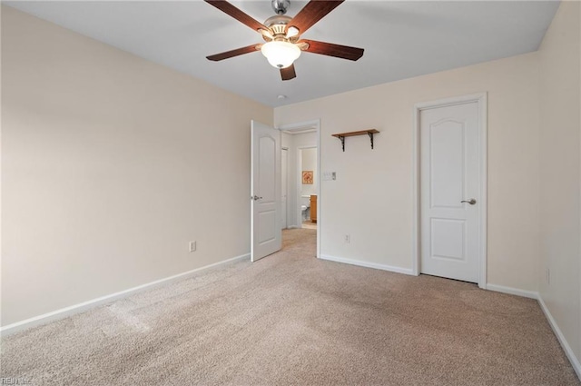 unfurnished bedroom featuring ceiling fan, baseboards, and carpet floors