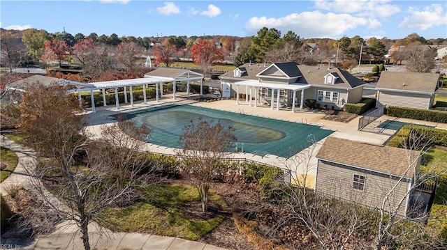 view of pool featuring a fenced in pool, a pergola, a patio, and fence