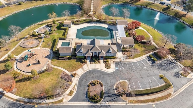 birds eye view of property featuring a water view